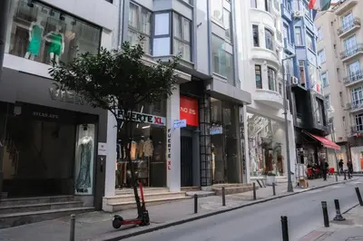 a city street with many shops and buildings at No25 Suites Nisantasi in Istanbul
