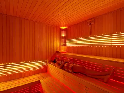 a sauna with two people laying in it at Sedef Apartments Pera in Istanbul