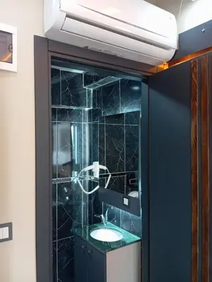 a bathroom with a sink and a mirror at Bonita Boutique in Istanbul