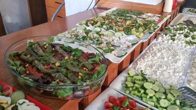 a table with many different types of food on it at Sirkeci Esen Apart in Istanbul