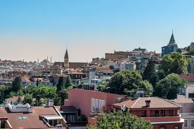 a view of a city with buildings and roofs at Stylish Duplex House with a Special Terrace in Istanbul