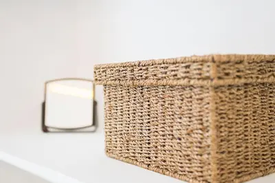 a wicker basket sitting on a table with a mirror at Beautiful 2BR House w/AC 400meters Taksim Square in Istanbul