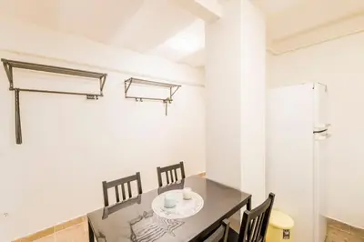 a dining room with a table and chairs at Beautiful 1 Br Apt. w/AC 400 meters Taksim Square in Istanbul