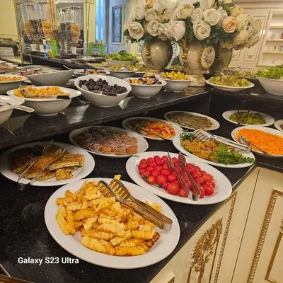 a buffet with many plates of food on a table at Hatay Hotel in Istanbul