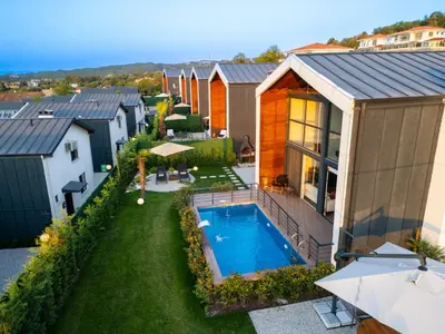 an aerial view of a house with a swimming pool at Trio Palazio Sapanca in Sapanca