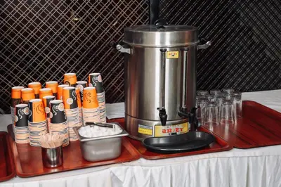 a mixer on a table with plates and cups at Topkapi Golden Time Hotel in Istanbul