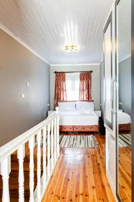 a bedroom with a bed and a window at The Wall Private Mansion Kumkapı in Istanbul