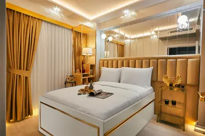 a bedroom with a large white bed in a room at Mitspark in Istanbul