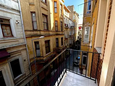 a view of a city street from a balcony at Galata Calm Tale Hotel in Istanbul