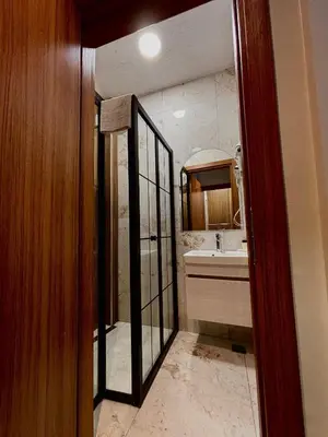 a bathroom with a sink and a mirror at Galata Calm Tale Hotel in Istanbul