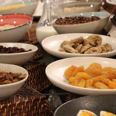 a table topped with bowls of nuts and other foods at Gzh Park Bosphorus in Istanbul