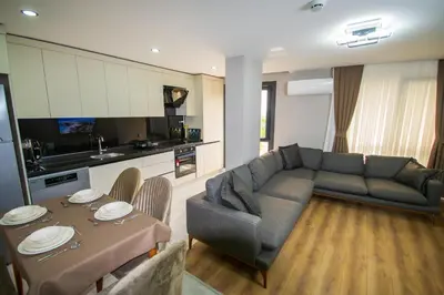 a living room with a couch and a table at Luxury Life Suites in Istanbul