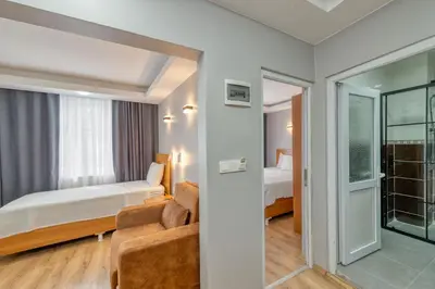 a hotel room with a bed and a window at Pio Apart Hotel in Istanbul