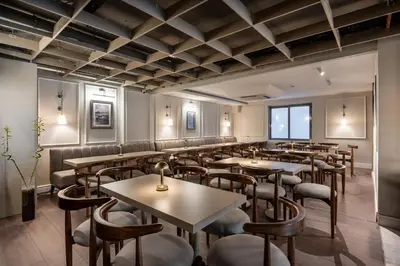 a dining room with tables and chairs at Noble Pangaltı in Istanbul