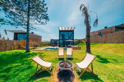 a group of chairs and a fire pit in a yard at Stay in Sapanca in Sapanca