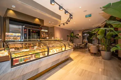 a bakery with a display case with donuts in it at Rayelin Hotel Old Town in Istanbul