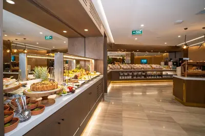 a buffet line with food on display in a store at Rayelin Hotel Old Town in Istanbul