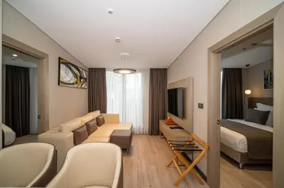 a living room with a couch and a bed at Rayelin Hotel Old Town in Istanbul