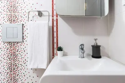 a bathroom with a white sink and a shower at The best of the Bosphorus & comfortable apartment in Istanbul