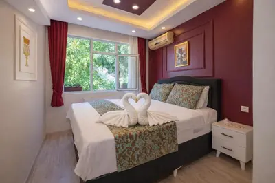 a bedroom with a bed with two hearts on it at Konak Grand Bella Sultanahmet in Istanbul