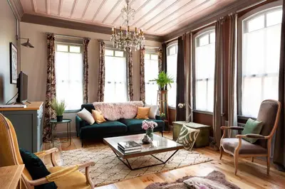 a living room with a couch and a table at Tastefully decorated house in Old city - Rose in Istanbul