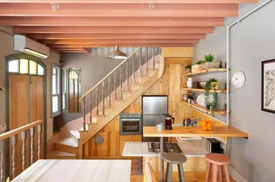 a staircase in a tiny house with a kitchen at Tastefully decorated house in Old city - Rose in Istanbul