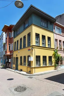 a yellow and blue building on a city street at Tastefully decorated house in Old city - Rose in Istanbul