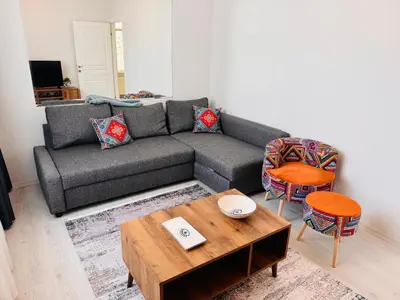 a living room with a couch and a coffee table at Jasmin in Istanbul