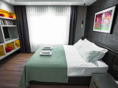 a bedroom with a bed with two towels on it at Sea Sparkle in Istanbul