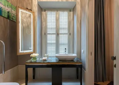 a bathroom with a sink and a window at 10 Karakoy in Istanbul