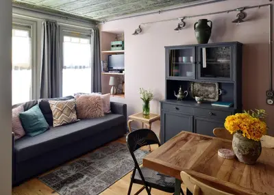 a living room with a couch and a table at Golden Horn Views from The Saffron House in Old Istanbul in Istanbul