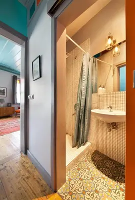 a bathroom with a shower and a sink at Enjoy Golden Horn views from Tangerine house in Istanbul