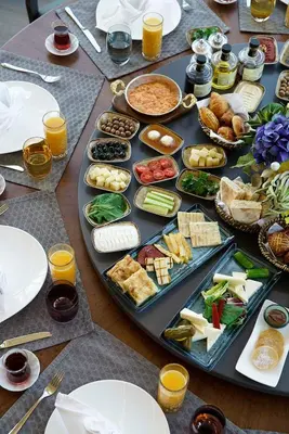 a table with a bunch of food on it at Lazzoni Hotel in Istanbul