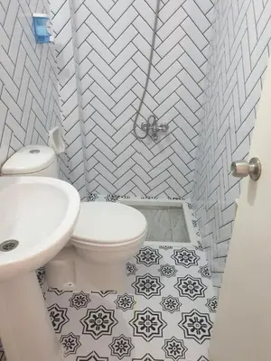 a bathroom with a toilet and a sink at Hotel Acar in Istanbul