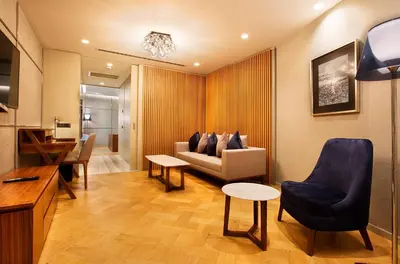 a living room with a couch and a table at Fer Hotel in Istanbul