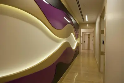 a hallway with a painting on the wall at The Leos Residence in Istanbul