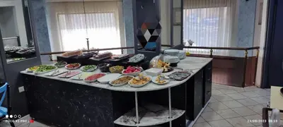 a buffet with many different types of food on a table at Hotel Oz Villa in Istanbul