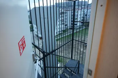 a door to a room with a view of a city at Visse Hotel in Mudanya