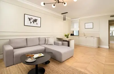 a living room with a couch and a table at Vucino Suites in Istanbul