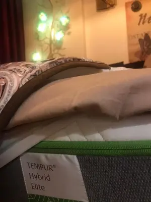 a close up of a bed with a sign on it at İstanbul Ataköy Residance Bakırköy Site İçi luxury daire in Istanbul