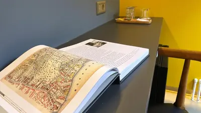 a book sitting on top of a table at Nevv Bosphorus Hotel & Suites in Istanbul