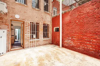 a brick building with a door in front of it at Armel Homes Taksim in Istanbul