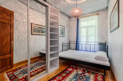 a bedroom with a bunk bed and a window at Historic Spacious Galata Apartment in Istanbul