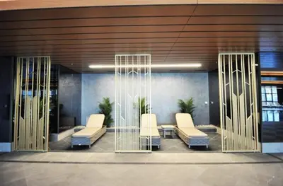 a waiting room with white chairs in a building at Beautiful Bright 2Bed - ParkingPoolTerrace! #341 in Istanbul