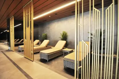 a waiting room with chairs and a mirror at Beautiful Bright 2Bed - ParkingPoolTerrace! #341 in Istanbul