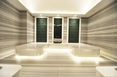 a bathroom with two white tubs and two windows at Elegant 1BD Terrace Gem PoolParking! #344 in Istanbul