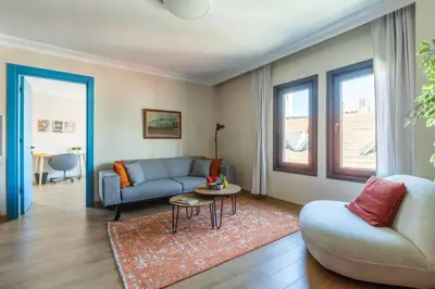 a living room with a couch and a table at Gorgeous Airy 2BD2Bath Bosphorus Views! #358 in Istanbul
