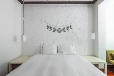 a bedroom with a large white bed with two pillows at Gorgeous Bright 2Bed1Bath Bosphorus Views! #356 in Istanbul