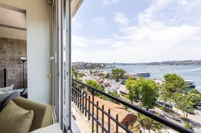 a balcony with a view of the water at Gorgeous Bright 2Bed1Bath Bosphorus Views! #356 in Istanbul