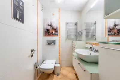 a bathroom with a toilet and a sink at Gorgeous Bright 2Bed1Bath Bosphorus Views! #356 in Istanbul